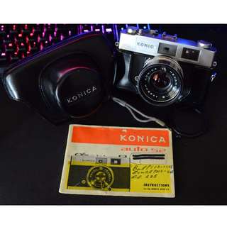 Konica Auto S2 1965 Rangefinder Camera with Original genuine leather case and Manual.