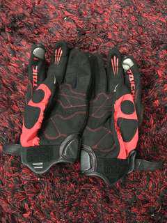 Used riding gloves