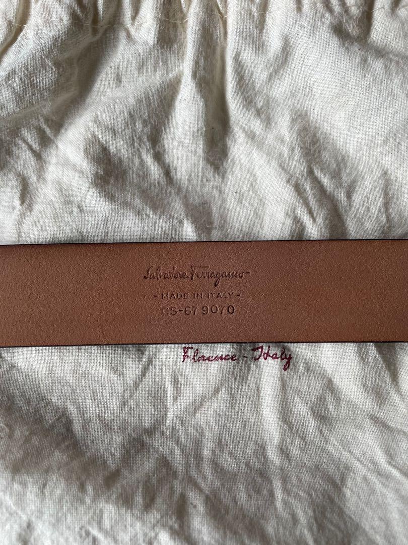 Ferragamo Dark Red Maroon leather belt (Category: Belts) located in Singapore. Submitted by masterjayr (Listing ID 1121175027, Image 4). Description: Salvatore Ferragamo Varina Macron calf leather belt for sale. I got it fully restored last month at Ngee Ann cobbler with the buckle redipped in matte black and the dark red leather repainted and restored. Only one faint scratch remaining near the loop holes as you can see from the picture. It has n