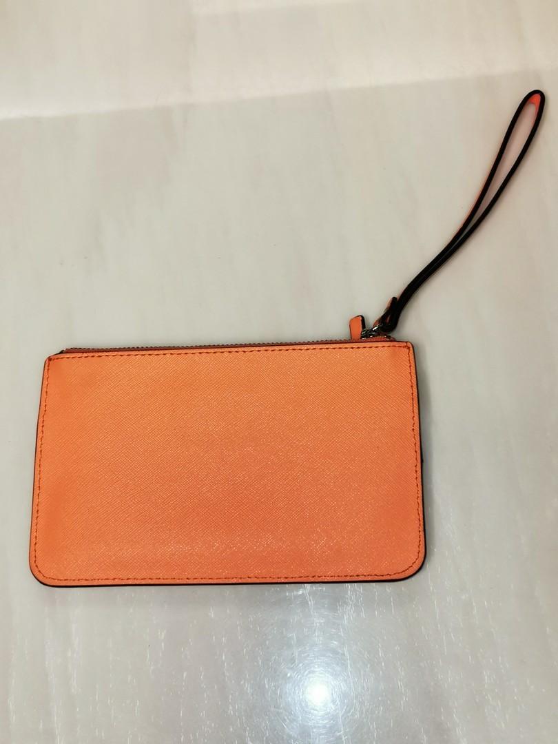 Original Kate Spade Wristlet (Category: Clutches) located in Singapore. Submitted by jh833 (Listing ID 1083098095, Image 2). Description: Original Kate Spade wristlet. Lightly used and hence very new looking. Similar product retailing at almost $90..
