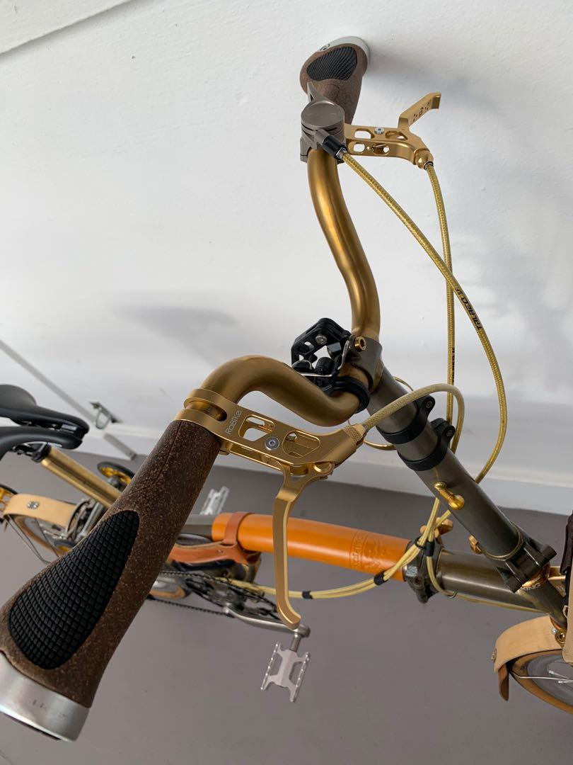 Brompton Superlight Lacquer 7-speed with rare mods - thx4ride, titanium cranks, Suncord, Selle Italia, Chris King, Extralite, Rabike, H&H, Tiparts, Aceoffix (Category: Bicycles) located in Singapore. Submitted by discolite (Listing ID 1177203290, Image 10). Description: Brompton Superlight Lacquer with titanium rear triangle and fork. Converted to 7 speed. Thx4ride parts. Custom titanium cranks, seatpost, handlebar. Everything is top-end. Recentl