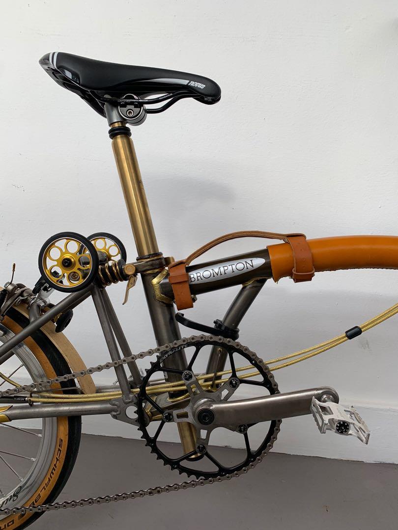 Brompton Superlight Lacquer 7-speed with rare mods - thx4ride, titanium cranks, Suncord, Selle Italia, Chris King, Extralite, Rabike, H&H, Tiparts, Aceoffix (Category: Bicycles) located in Singapore. Submitted by discolite (Listing ID 1177203290, Image 3). Description: Brompton Superlight Lacquer with titanium rear triangle and fork. Converted to 7 speed. Thx4ride parts. Custom titanium cranks, seatpost, handlebar. Everything is top-end. Recently