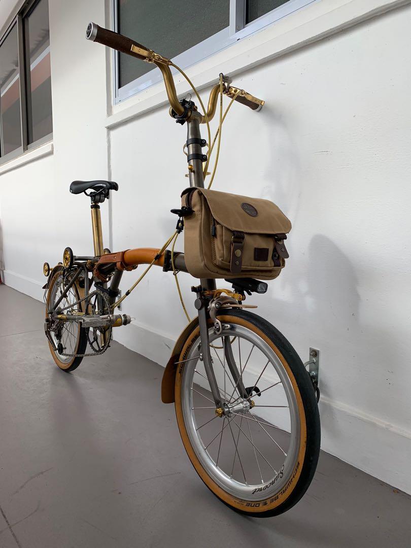 Brompton Superlight Lacquer 7-speed with rare mods - thx4ride, titanium cranks, Suncord, Selle Italia, Chris King, Extralite, Rabike, H&H, Tiparts, Aceoffix (Category: Bicycles) located in Singapore. Submitted by discolite (Listing ID 1177203290, Image 2). Description: Brompton Superlight Lacquer with titanium rear triangle and fork. Converted to 7 speed. Thx4ride parts. Custom titanium cranks, seatpost, handlebar. Everything is top-end. Recently