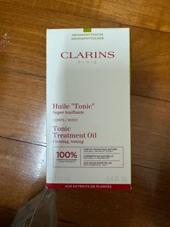 Clarins body huele tonic oil for firming , toning and  stretch marks postpartum