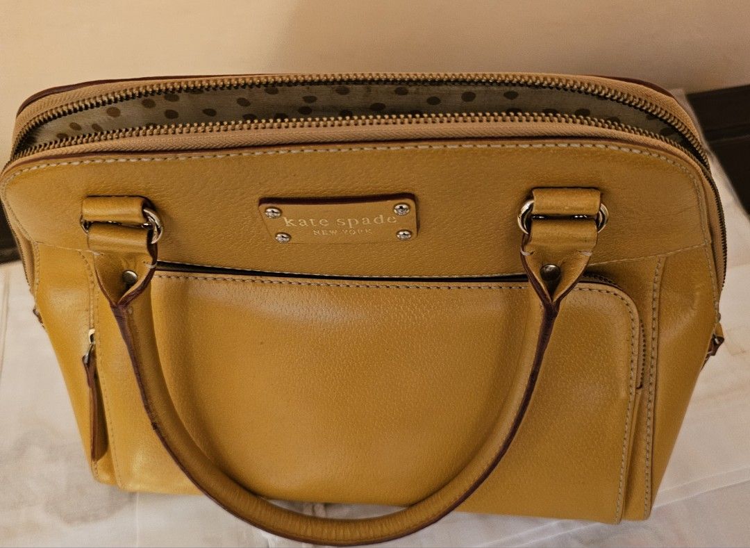 Kate Spate tote bag (Category: Tote Bags) located in Singapore. Submitted by caroline1390784 (Listing ID 1332811964, Image 1). Description: A bag that could store many necessities when you go out. The exterior compartment (pocket) comes very handy too..