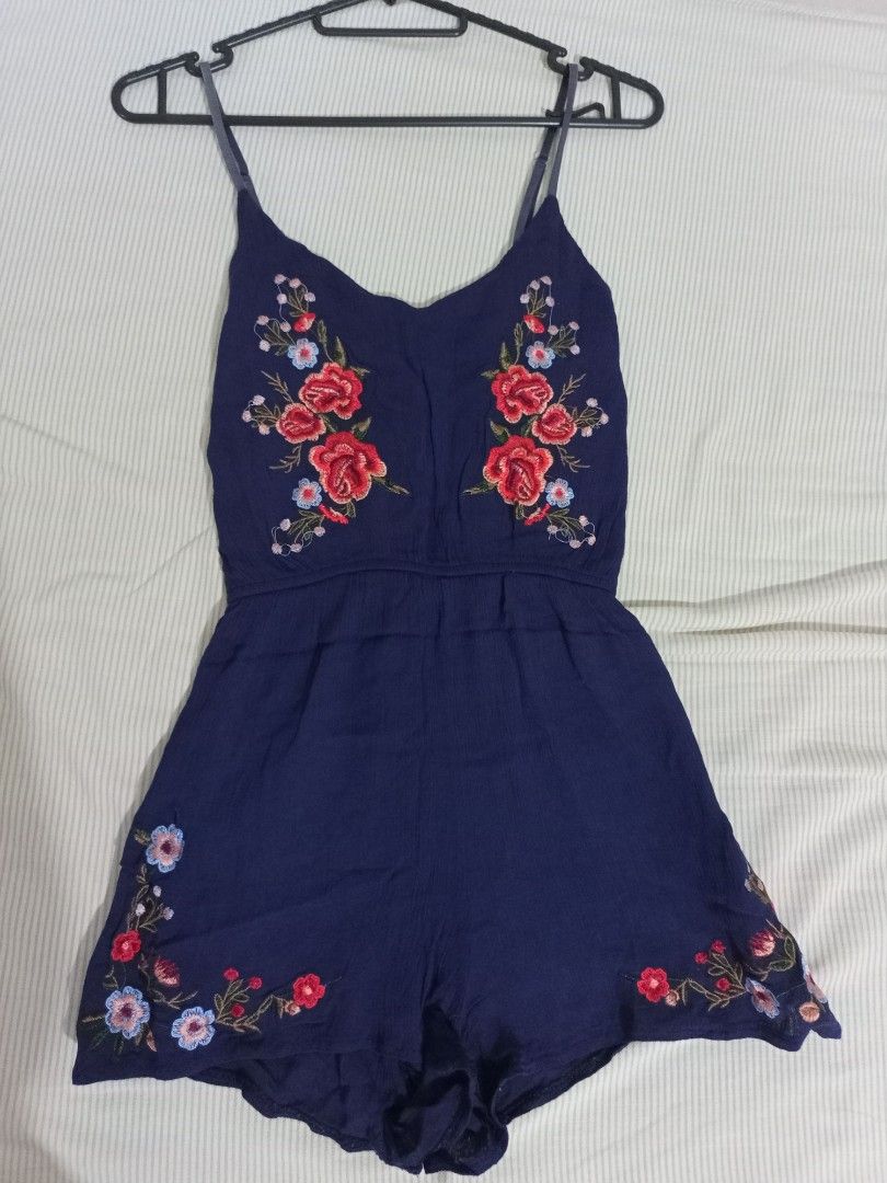Dark Blue Embroidered Floral Romper (Category: Rompers) located in Singapore. Submitted by black.kat (Listing ID 1327794083, Image 1). Description: elastic waist fits size xs and s meet up under blk 54 toa payoh or toa payoh/braddell mrt tracked mail +$2.