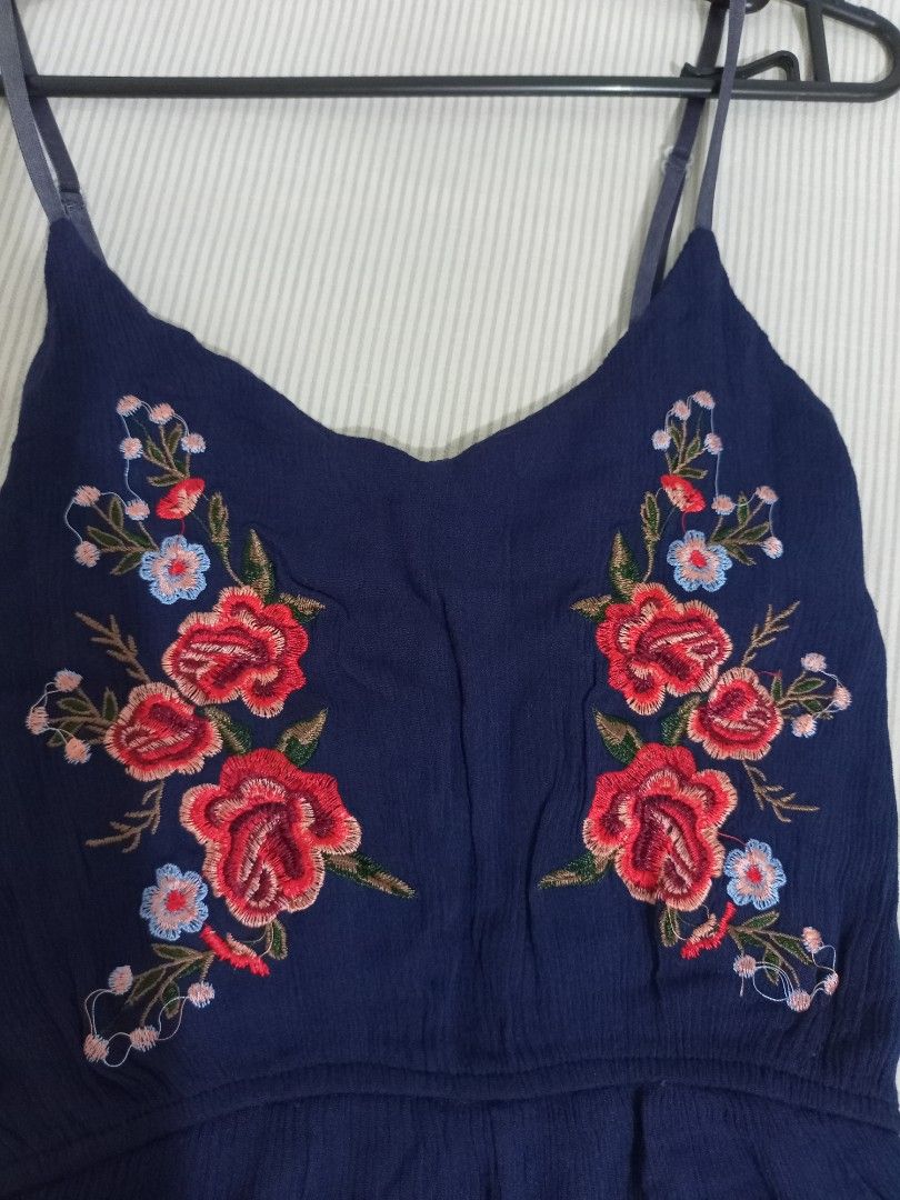 Dark Blue Embroidered Floral Romper (Category: Rompers) located in Singapore. Submitted by black.kat (Listing ID 1327794083, Image 2). Description: elastic waist fits size xs and s meet up under blk 54 toa payoh or toa payoh/braddell mrt tracked mail +$2.