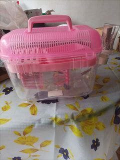 Hamster carrier with water bottle, feeding bowl and wheels