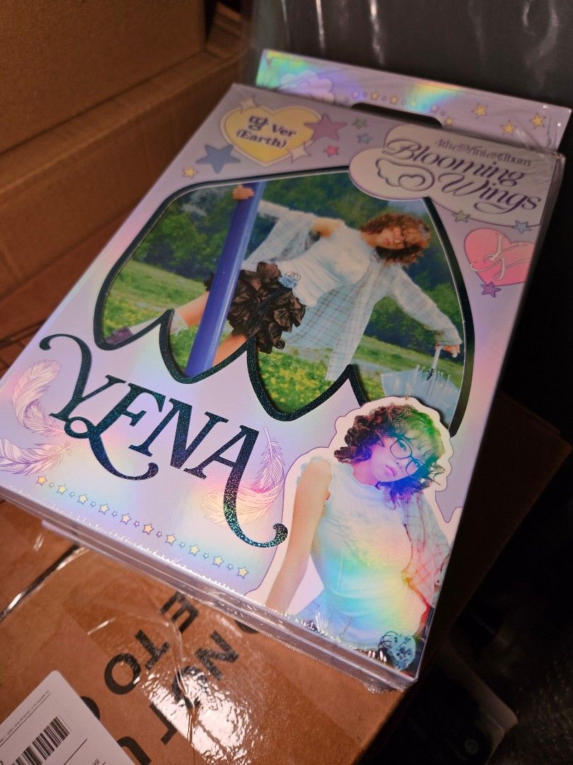 YENA Blooming Wings Album (Category: K-Wave Merchandise) located in Singapore. Submitted by milkytiger (Listing ID 1403766602, Image 1). Description: Sealed. Not for fussy buyer. mailing +$2.50.