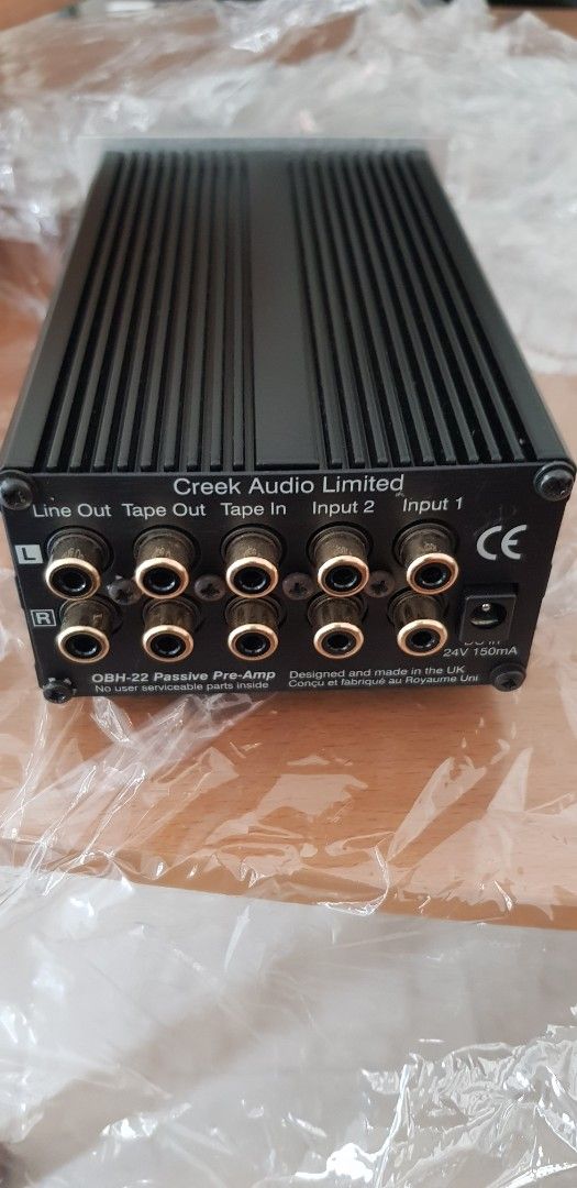 Creek OBH-22 Passive Pre-Amp (Control Pre Amp) (Category: Other Audio Equipment) located in Singapore. Submitted by lfran32 (Listing ID 1405010304, Image 2). Description: - Creek OBH-22 passive pre-amp - Includes original box, remote, operating instructions and original OBH 1 power supply. - Multiple inputs and outputs - Volume control and mute function - Auto power off once volume is selected for pure passive pass through to avoid any interferen
