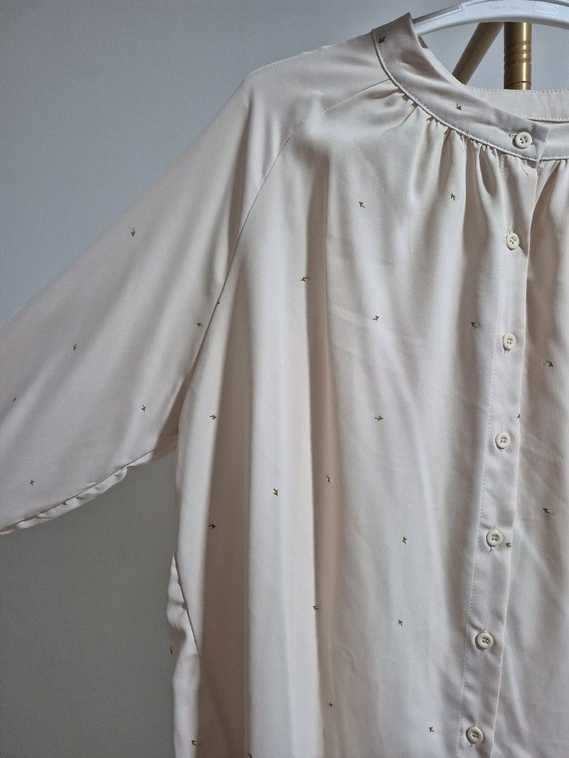 Deepduzt Vintage Cream Blouse with flower Print (Category: Blouses) located in Singapore. Submitted by hudhud2310 (Listing ID 1407121095, Image 4). Description: - ptp: 60cm, front length: 67cm, back length: 79cm - drop shoulder design - Vintage cream blouse - Delicate flower print - Button-down front - Long sleeves with lace detailing .