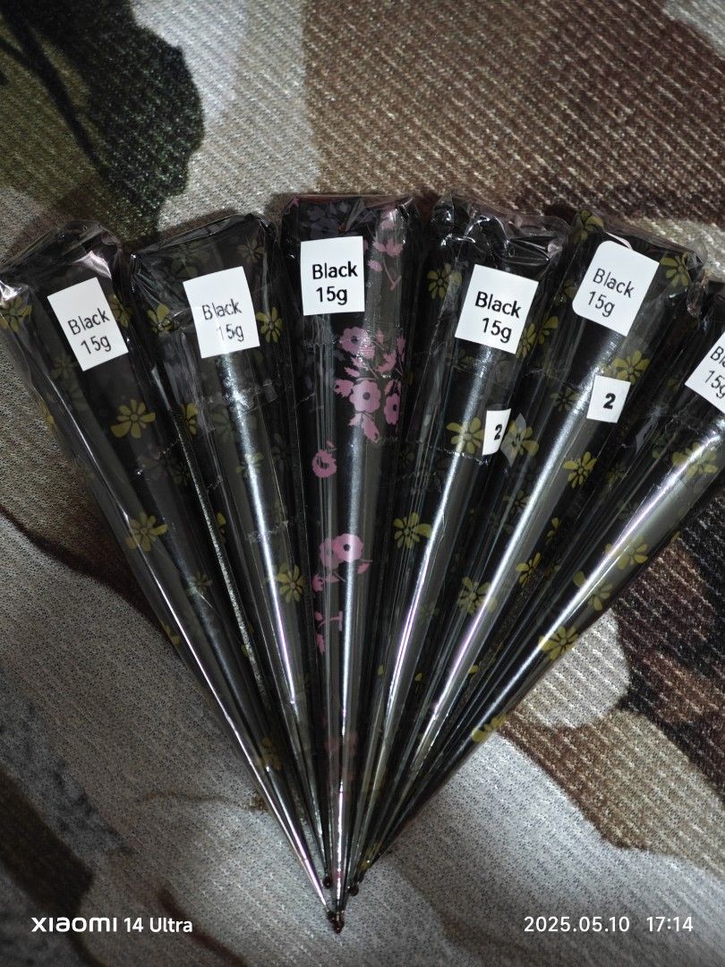 Henna Cones (Category: Hands & Nails) located in Singapore. Submitted by sheryapihenna (Listing ID 1299821646, Image 8). Description: Each cone weighing at +/- 12grams Get ready for your next big event with our Instant Henna Cones in the colors Red, Maroon, and Black as well as Natural Cones. Each cone is sold separately at the affordable price of $3. Our Henna Cones are perfect for achieving intricate designs with ease. They are made from high-q