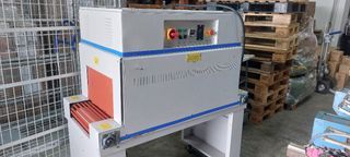 SHRINK WRAPPING MACHINE