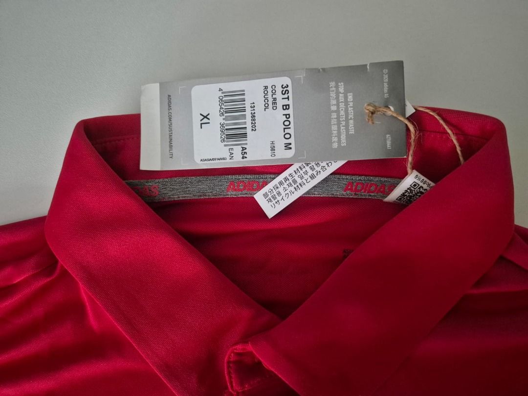 Brand New Adidas SICCI Games Polo Shirt - XL - Red (Category: Tshirts & Polo Shirts) located in Singapore. Submitted by oddgem_d6ef98 (Listing ID 1386423730, Image 3). Description: - Brand new Adidas polo shirt - Features the SICCI Games logo - Size: XL - Made with recycled materials - Suitable for sports and casual wear - Comes with original tags and packaging -Product care instructions in the bag.