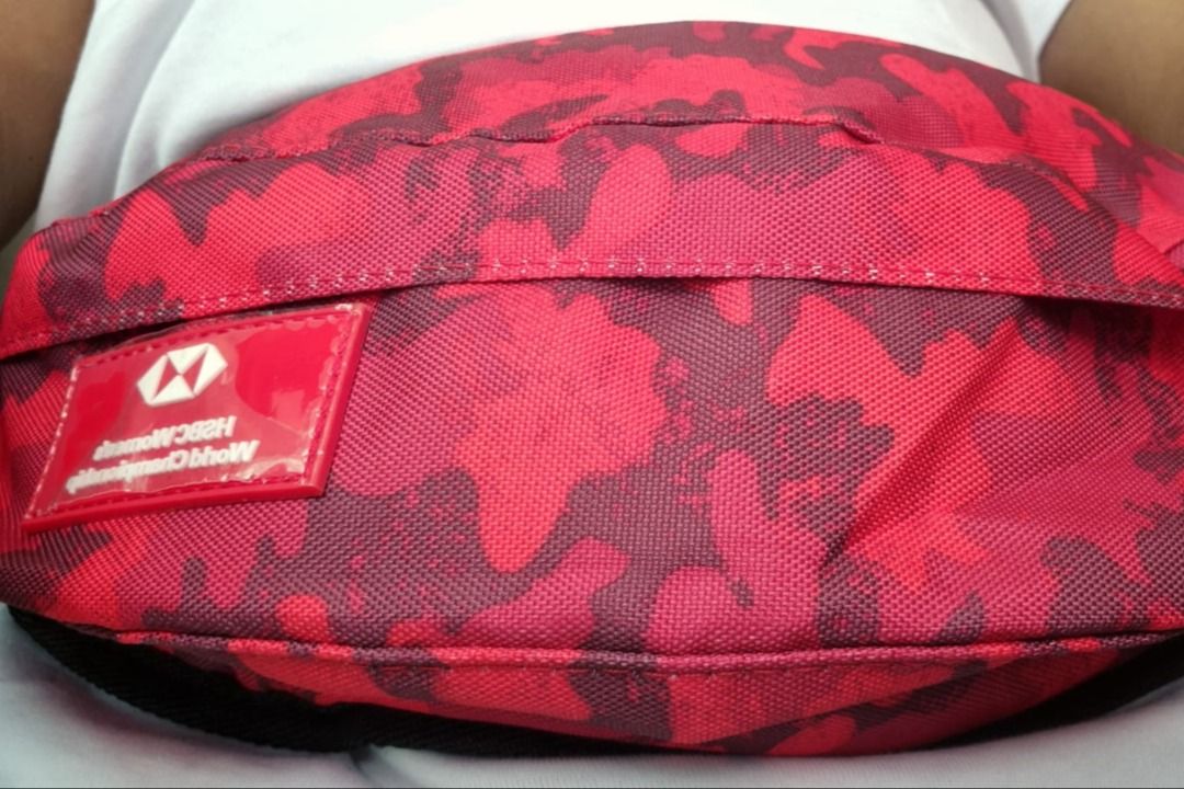 HSBC WOMEN’S WORLD CHAMPIONSHIP Fanny Pack/Sling Bag (Category: Sling Bags) located in Singapore. Submitted by oddgem_d6ef98 (Listing ID 1361718663, Image 4). Description: -Brand new -Beautiful Red Camouflage -Comes with two outer zips and a compartment -The main compartment comes with an inner compartment with a zip. -Adjustable strap .