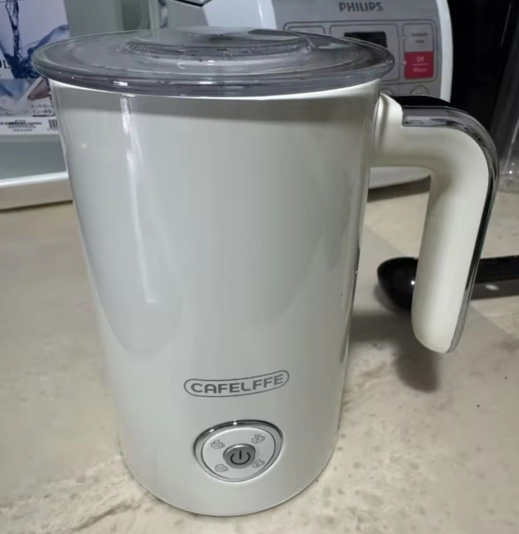 CAFELFFE Milk Frother - Creamy Latte at Home! (Category: Coffee Machines & Makers) located in Singapore. Submitted by domrene (Listing ID 1391914763, Image 2). Description: Enjoy cafe-quality lattes and cappuccinos with this CAFELFFE milk frother. Easy to use and clean. Perfect for coffee lovers! Still New as Used only twice. Refer to photo. No Trades, No Refund & No Exchange after Sold. Above Price before Postage / Courier Add $4 for Courier.