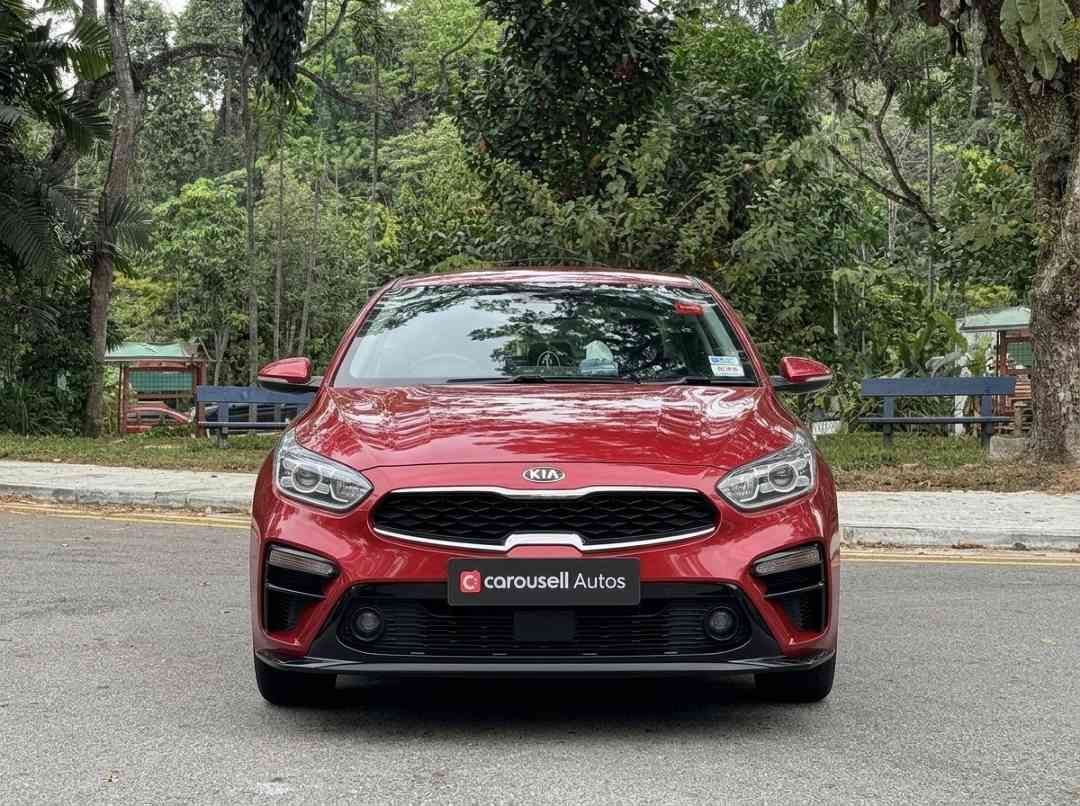 Kia Cerato 1.6 EX (A) (Category: Used Cars) located in Singapore. Submitted by carousellcars (Listing ID 1451203421, Image 1). Description: Well maintained and in excellent condition. Perfect for small family and ample boot space. Features: 1.6L DOHC engine, 6-speed automatic, cruise control, multi-function steering, reverse camera, keyless entry, Bluetooth connectivity. Accessories: New rims fitted Jan 2026 Sales Contact: Petrus Paul tel:9833036