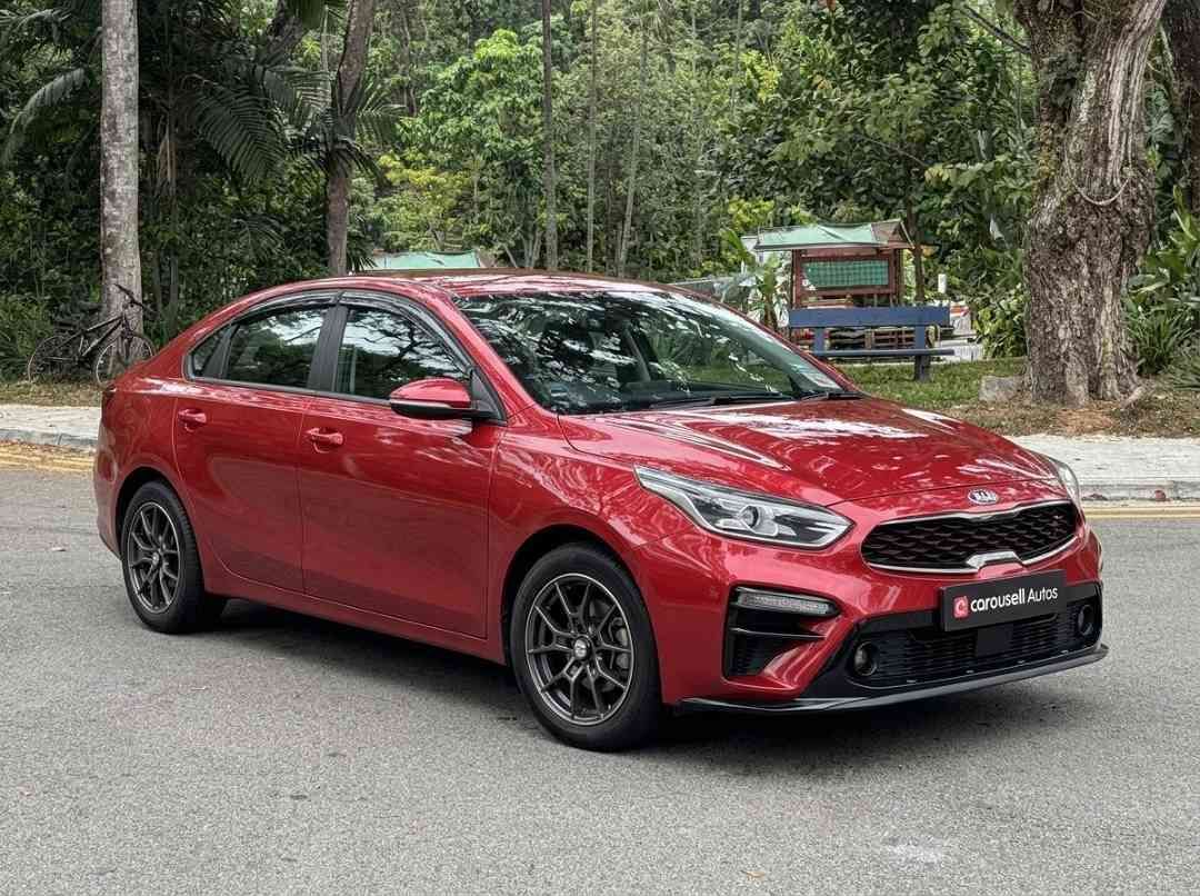 Kia Cerato 1.6 EX (A) (Category: Used Cars) located in Singapore. Submitted by carousellcars (Listing ID 1451203421, Image 2). Description: Well maintained and in excellent condition. Perfect for small family and ample boot space. Features: 1.6L DOHC engine, 6-speed automatic, cruise control, multi-function steering, reverse camera, keyless entry, Bluetooth connectivity. Accessories: New rims fitted Jan 2026 Sales Contact: Petrus Paul tel:9833036