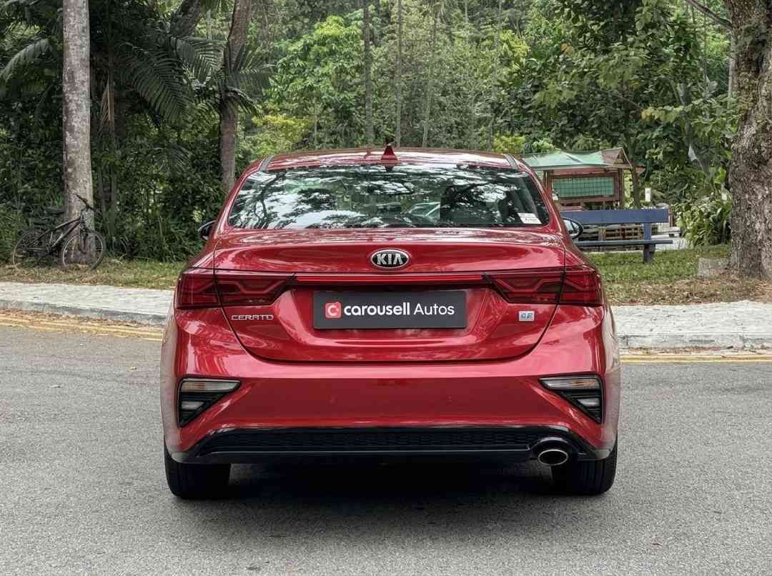 Kia Cerato 1.6 EX (A) (Category: Used Cars) located in Singapore. Submitted by carousellcars (Listing ID 1451203421, Image 5). Description: Well maintained and in excellent condition. Perfect for small family and ample boot space. Features: 1.6L DOHC engine, 6-speed automatic, cruise control, multi-function steering, reverse camera, keyless entry, Bluetooth connectivity. Accessories: New rims fitted Jan 2026 Sales Contact: Petrus Paul tel:9833036