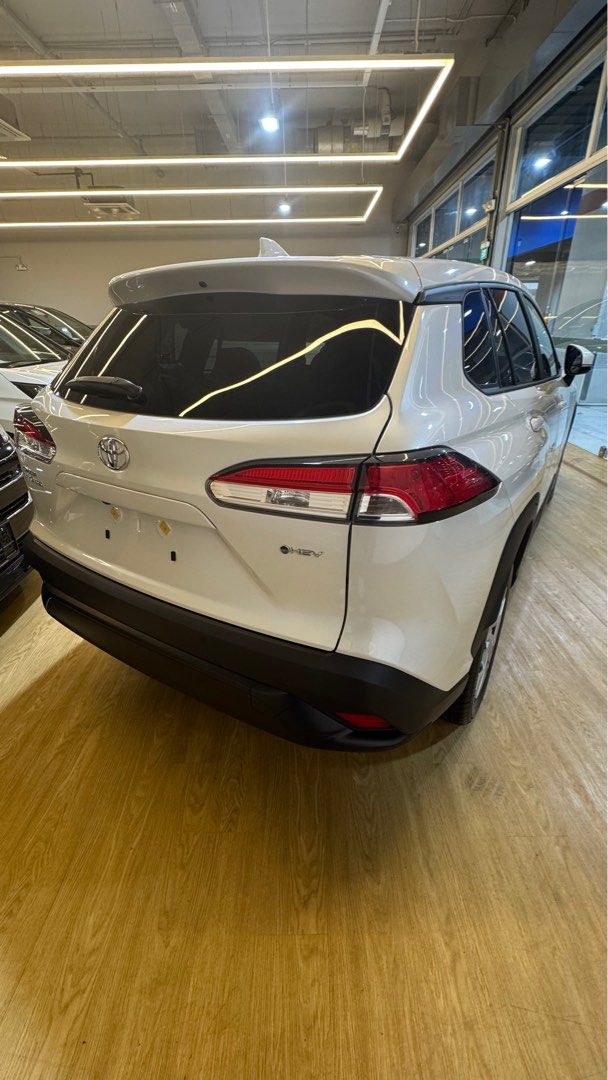 Toyota Corolla Cross 1.8A (Category: Parallel Imports) located in Singapore. Submitted by autozenbykenz (Listing ID 1414928783, Image 9). Description: Key Features & Specs: Powertrain: 1.8L Petrol Engine + Electric Motor with E-CVT Transmission. Power: Around 138 horsepower. Efficiency: Excellent fuel economy 26.2 km/L Technology: Toyota Safety Sense (Pre-Collision, Lane Departure Alert, etc.), 8-inch Multimedia System, Apple CarPlay/Android Auto