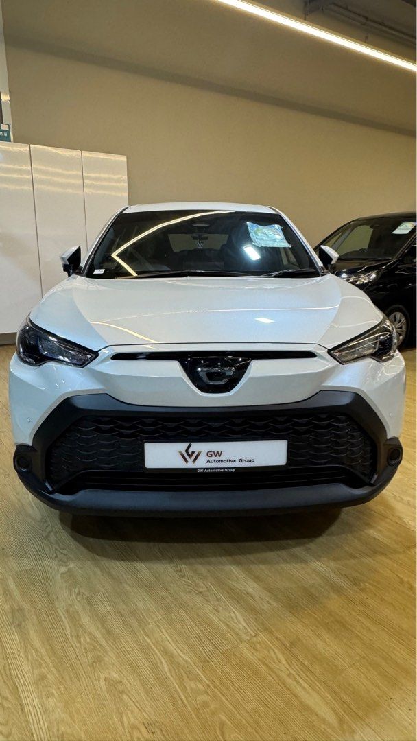 Toyota Corolla Cross 1.8A (Category: Parallel Imports) located in Singapore. Submitted by autozenbykenz (Listing ID 1414928783, Image 1). Description: Key Features & Specs: Powertrain: 1.8L Petrol Engine + Electric Motor with E-CVT Transmission. Power: Around 138 horsepower. Efficiency: Excellent fuel economy 26.2 km/L Technology: Toyota Safety Sense (Pre-Collision, Lane Departure Alert, etc.), 8-inch Multimedia System, Apple CarPlay/Android Auto