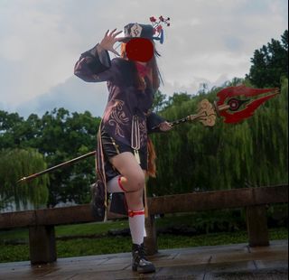 Hutao cosplay with weapon