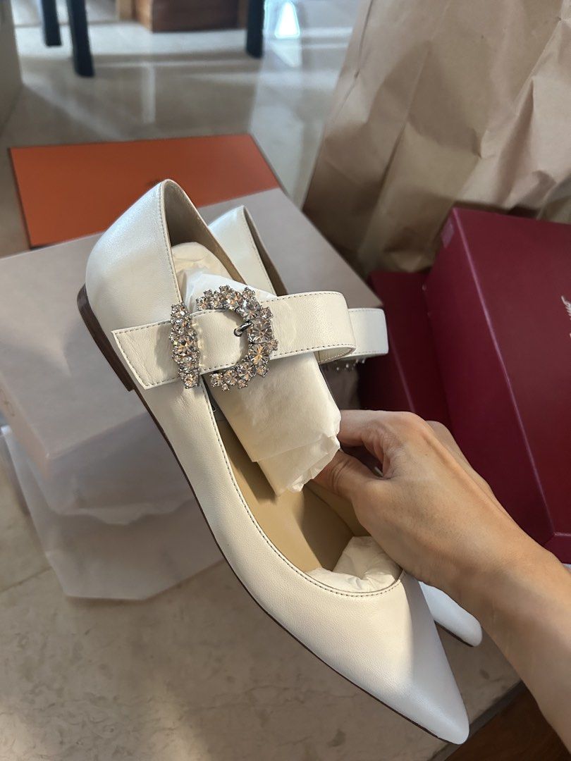 Jimmy Choo Cheri Flat - Milk - Size 39.5 (Category: Flats) located in Singapore. Submitted by 011284lynn (Listing ID 1421830373, Image 4). Description: - Brand new Jimmy Choo Cheri Flat - Color: Milk - Size: 39.5 - Features a crystal buckle - Comes with original box and packaging - Never worn.