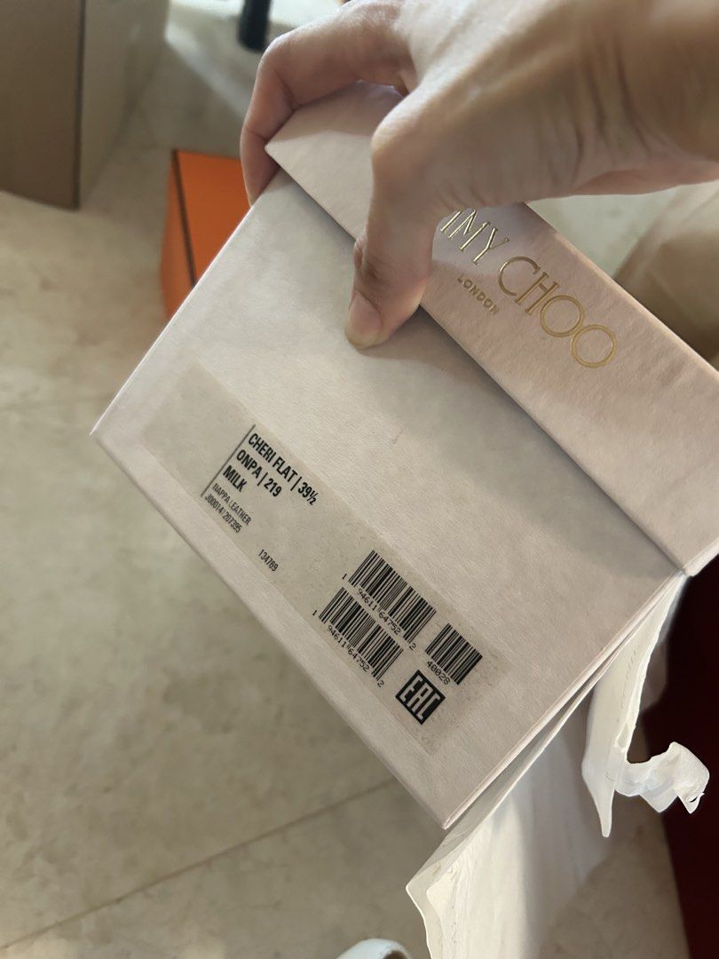 Jimmy Choo Cheri Flat - Milk - Size 39.5 (Category: Flats) located in Singapore. Submitted by 011284lynn (Listing ID 1421830373, Image 3). Description: - Brand new Jimmy Choo Cheri Flat - Color: Milk - Size: 39.5 - Features a crystal buckle - Comes with original box and packaging - Never worn.