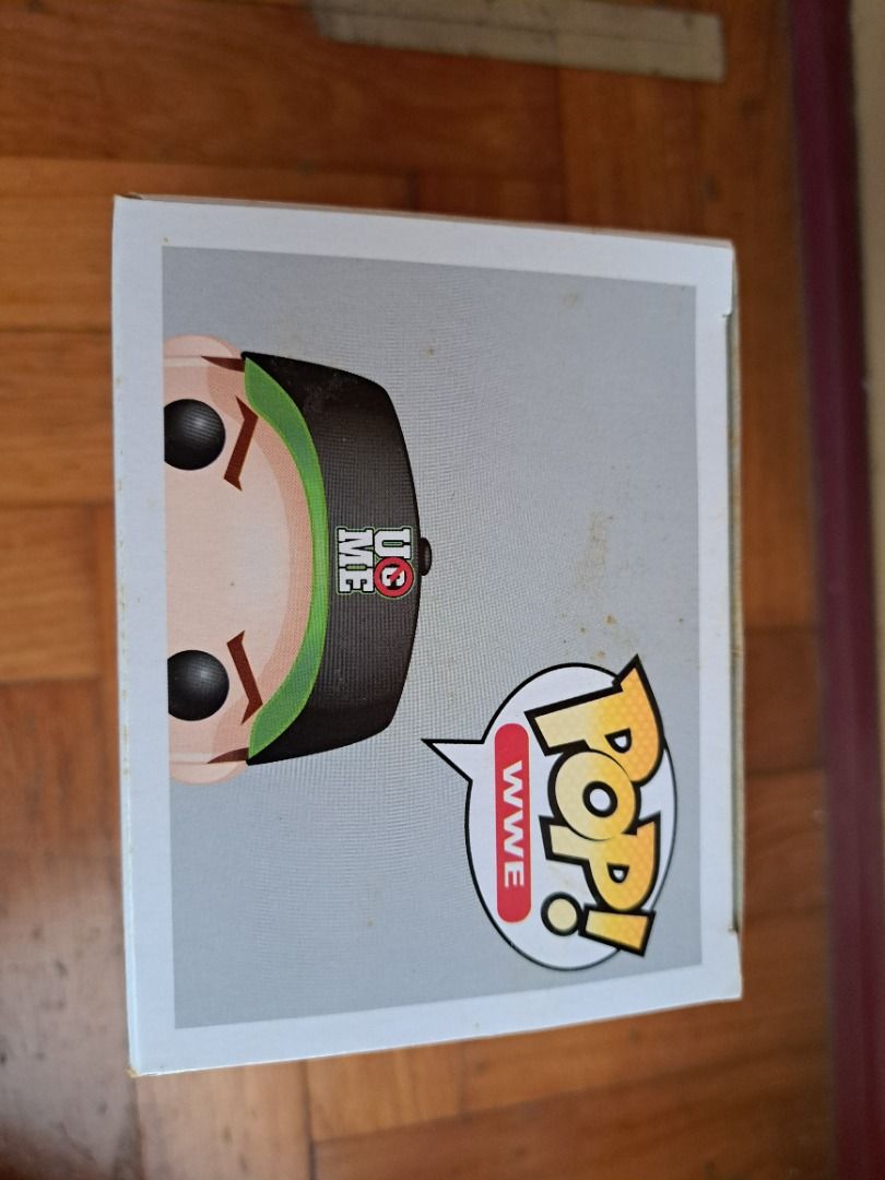 Funko Pop! WWE John Cena Green/Black Cap Vinyl Figure (Category: Toy Figures) located in Singapore. Submitted by mi2mo (Listing ID 1423229675, Image 2). Description: Figure has been kept in box and not played with. Box have some shelf wear, not for fussy collectors. Please see all photos for condition. PM for more details.