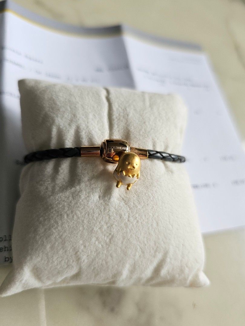 999 goldheart charm (Category: Charms) located in Singapore. Submitted by pompom2021 (Listing ID 1425915526, Image 2). Description: 999 24k goldheart gudetama charm. Goldheart retailing @ $298 in 2019 as per receipt. If keen in the goldheart bracelet, am selling it at $9..