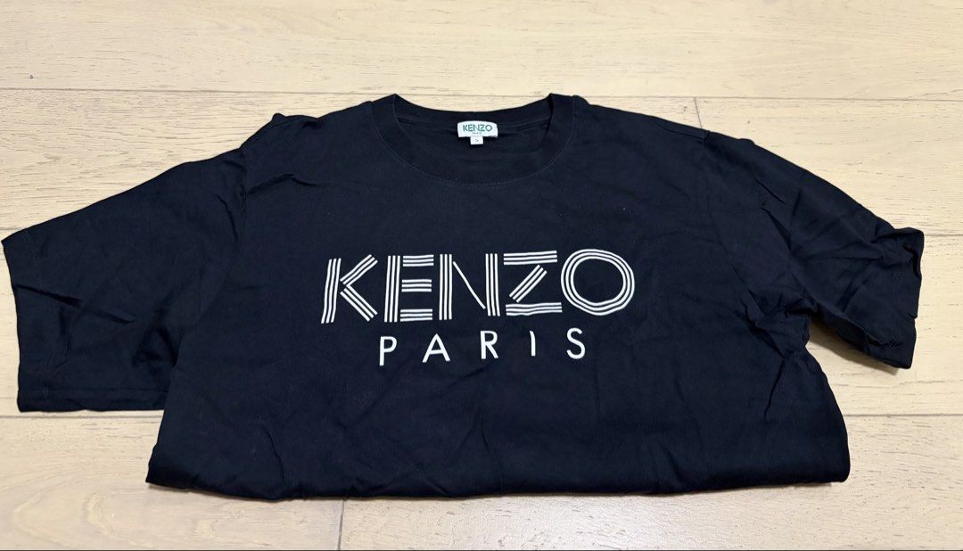 Kenzo Logo T-Shirt (Category: Tshirts & Polo Shirts) located in Singapore. Submitted by zw__l (Listing ID 1425942985, Image 1). Description: Color: Black Still in good condition. No Color fade. .