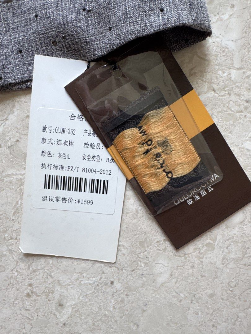 Grey Dress with Long Sleeves (Category: Dresses) located in Singapore. Submitted by sg_platinum (Listing ID 1426253009, Image 2). Description: Bought for $200+ PTP 46cm Waist 44cm Hip 48cm Mailing for $3.