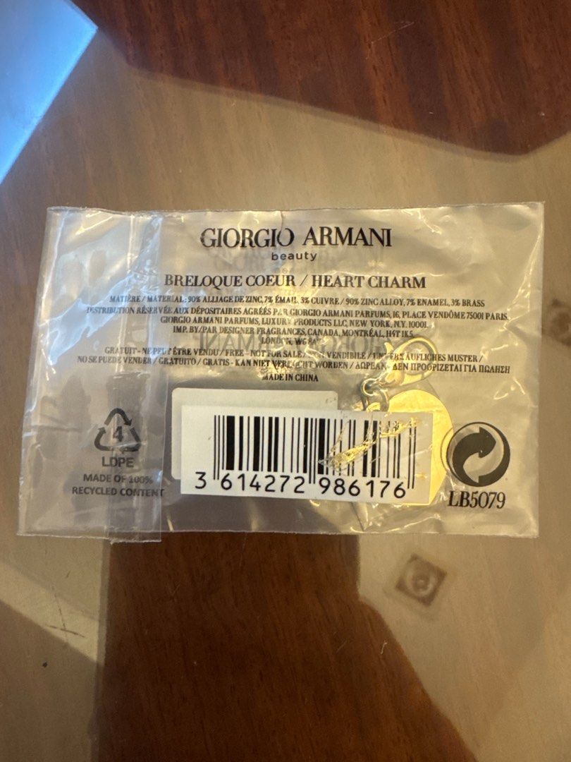 Giorgio Armani Beauty Heart Charm (Category: Charms) located in Singapore. Submitted by sg_platinum (Listing ID 1426659741, Image 2). Description: Mailing for $2.