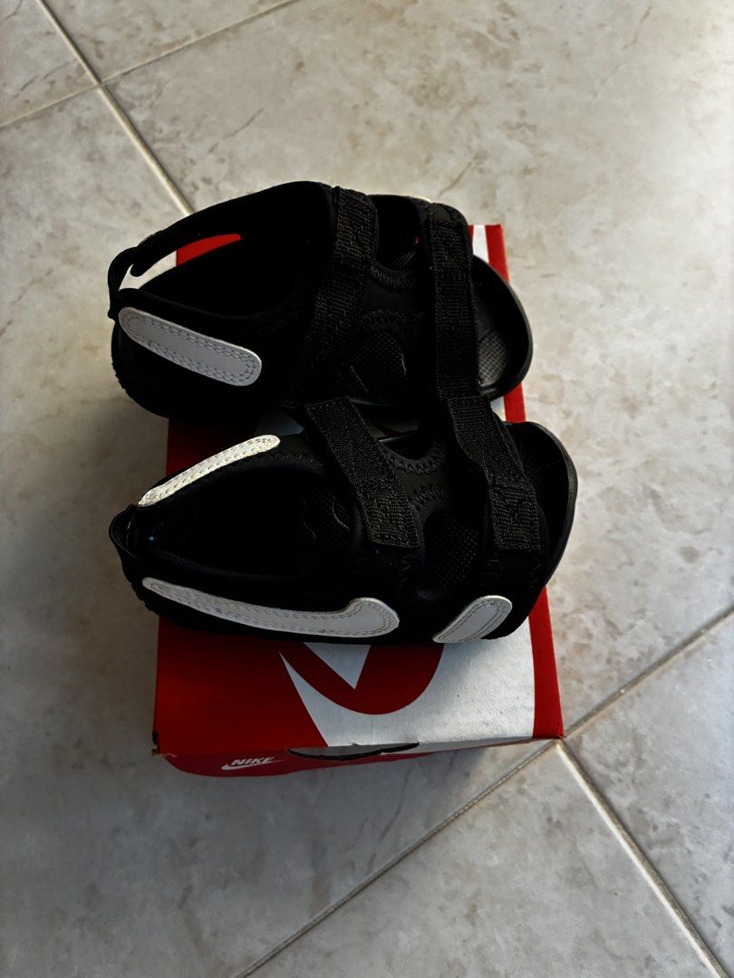 Young Children Nike shoes (Category: Babies & Kids Fashion) located in Singapore. Submitted by bobsgp (Listing ID 1429075318, Image 1). Description: -> 2 pair of N.I.K.E shoes - black one brand new | 21 or size 6 => 20$ - white one barely worn | Eur 23.5 or 13cm => 30$.