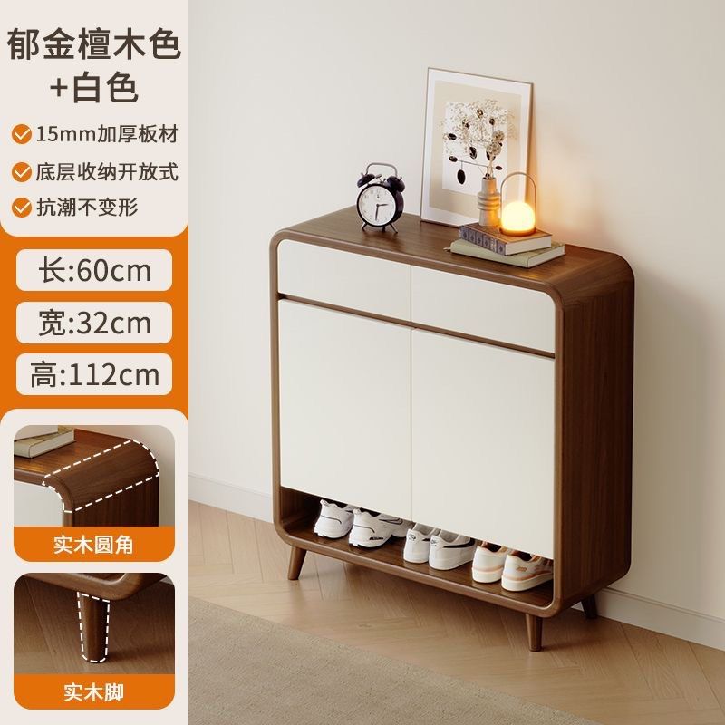 Modern Shoe Cabinet - Brown and White (Category: Shelves, Cabinets & Racks) located in Singapore. Submitted by xyjess (Listing ID 1432914658, Image 3). Description: Self collection at 613339 Self assembled Slight quality issue from origin. - Two doors and 2 drawers - Bottom shelf for extra storage - Made with 15mm thick board - Dimensions: 60cm (L) x 32cm (W) x 112cm (H) In use since moving in june .