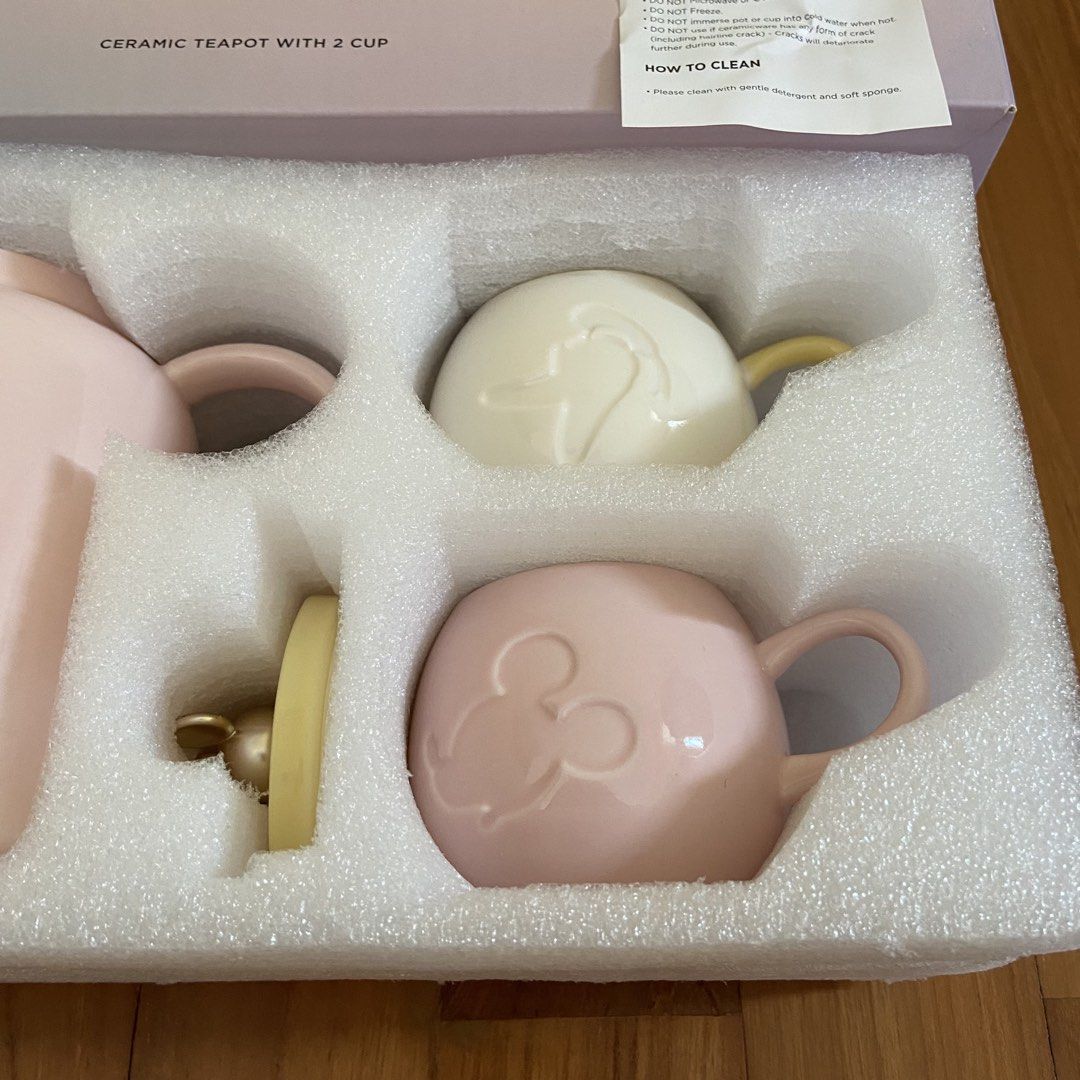 Disney 100 Ceramic Teapot with 2 Cups (Category: Coffee & Tea Tableware) located in Singapore. Submitted by komorebixyz (Listing ID 1433286181, Image 3). Description: Brand new. Meet up at my place along Upper Thomson Road only. No trades, no negotiation..