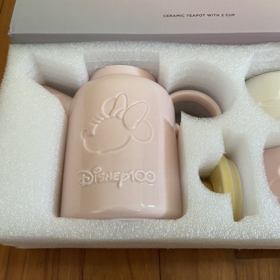 Disney 100 Ceramic Teapot with 2 Cups (Category: Coffee & Tea Tableware) located in Singapore. Submitted by komorebixyz (Listing ID 1433286181, Image 2). Description: Brand new. Meet up at my place along Upper Thomson Road only. No trades, no negotiation..