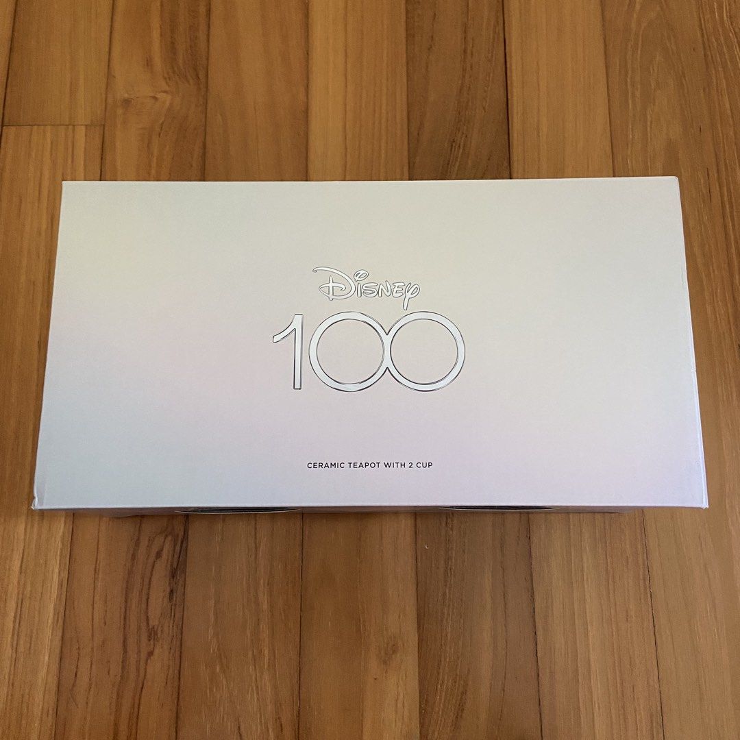 Disney 100 Ceramic Teapot with 2 Cups (Category: Coffee & Tea Tableware) located in Singapore. Submitted by komorebixyz (Listing ID 1433286181, Image 5). Description: Brand new. Meet up at my place along Upper Thomson Road only. No trades, no negotiation..