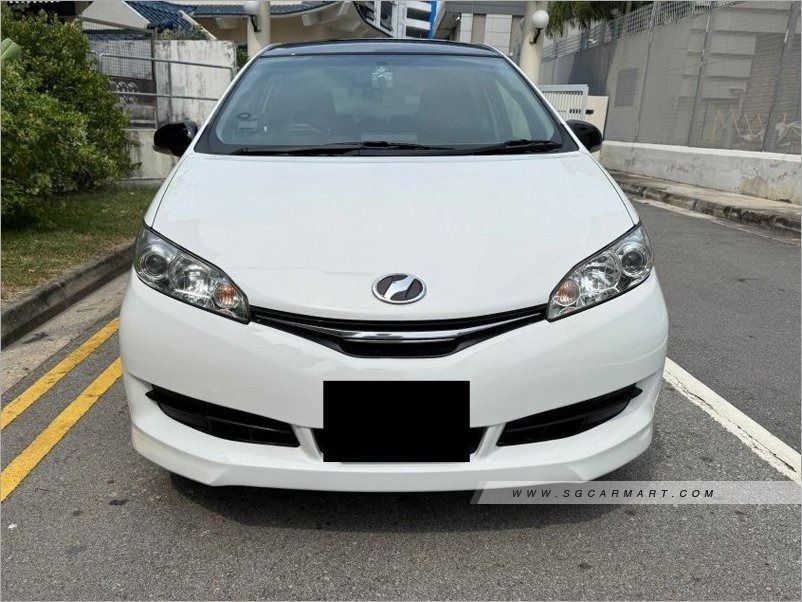 Toyota Wish 1.8 Elegance CVT (A) (Category: Used Cars) located in Singapore. Submitted by collin33 (Listing ID 1430060993, Image 1). Description: 1 owner. Classes white sporty. Well taken care. Wears and tears. Rectify buy with no regret.18" sport rim with Michelin tire, Android player too. Call Collin 88898049 to arrange for viewing test drive..