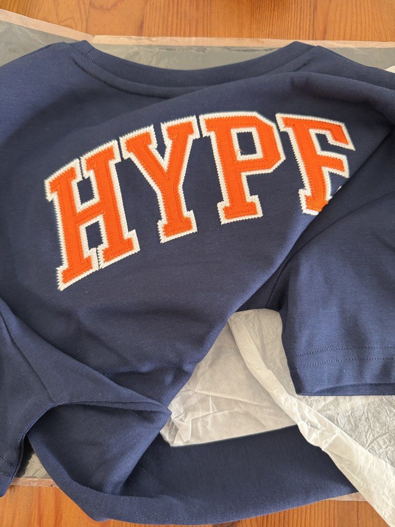 HYPE Navy Blue T-shirt - Size 160 - Brand New (Category: Babies & Kids Fashion) located in Singapore. Submitted by jr2224 (Listing ID 1438338943, Image 2). Description: - Brand new HYPE T-shirt - Navy blue color - Orange HYPE logo on front - Size 160 - With original tags - Perfect for casual wear Bought wrong size.