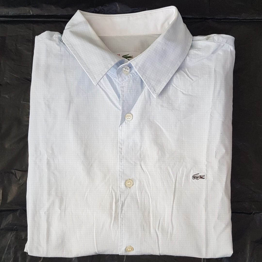 Original LACOSTE Smart Dress Shirt, Checker Blue & White Designer Shirt, Lacoste Logo, Cosmopolitan, Paris, FRANCE, Sleek 7 Buttons Long Sleeve Shirt, 40 MEDIUM Top, Regular Fit, Luxury Lifestyle, Timeless Appeal, Urban Style, Sophistication, Pop Culture (Category: Tshirts & Polo Shirts) located in Singapore. Submitted by warehouseno5 (Listing ID 1438730847, Image 1). Description: Original LACOSTE Smart Dress Shirt, Checker Light Blue & White Des