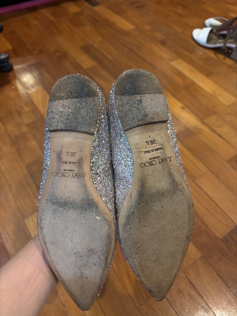 Jimmy Choo Glitter Flats with Bow (Category: Flats) located in Singapore. Submitted by chochang1989 (Listing ID 1435673648, Image 2). Description: - Jimmy Choo flats - Sparkling glitter finish - Delicate bow detail - Excellent condition - Comfortable and stylish - Perfect for special occasions or everyday wear.