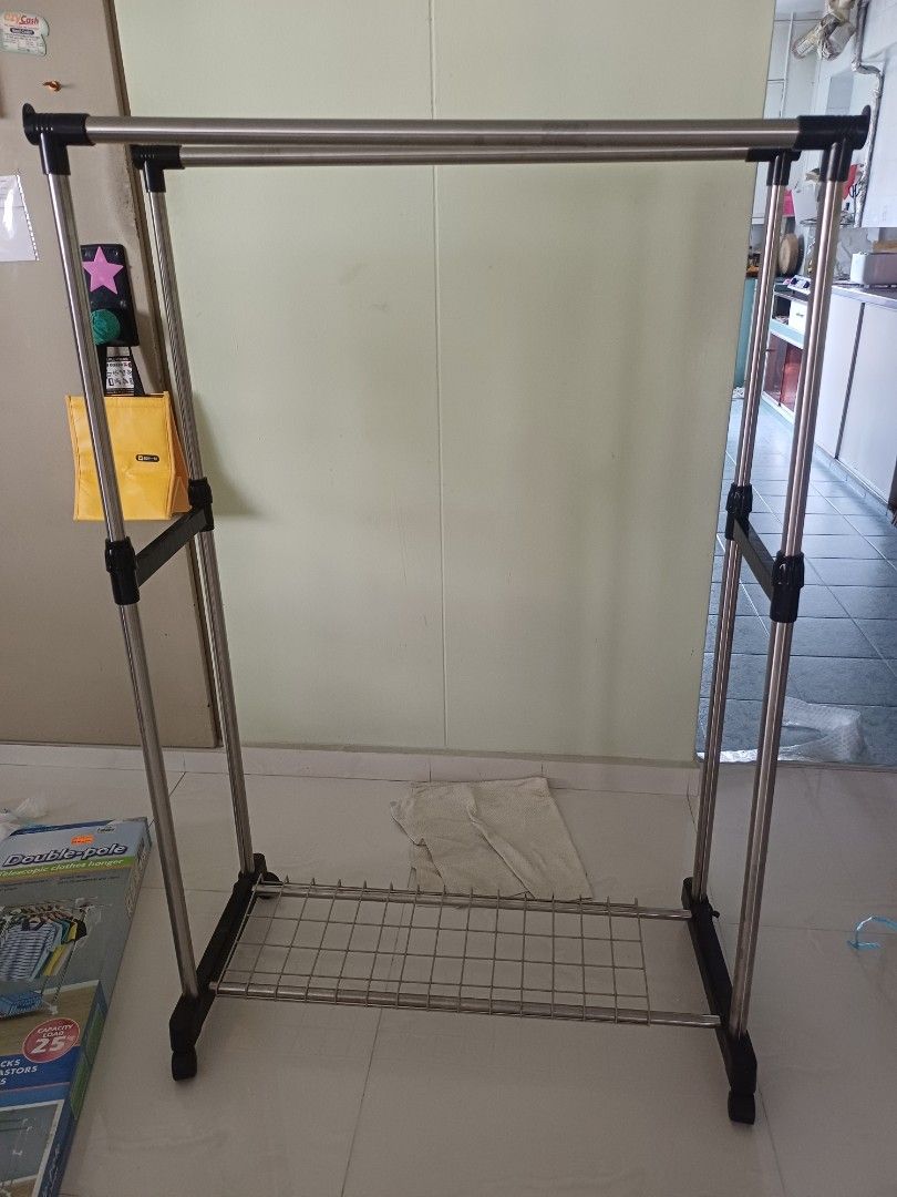 Double Pole Telescopic Clothes Hanger (Category: Clothes Drying Rack) located in Singapore. Submitted by rt1942 (Listing ID 1440262755, Image 2). Description: used before..