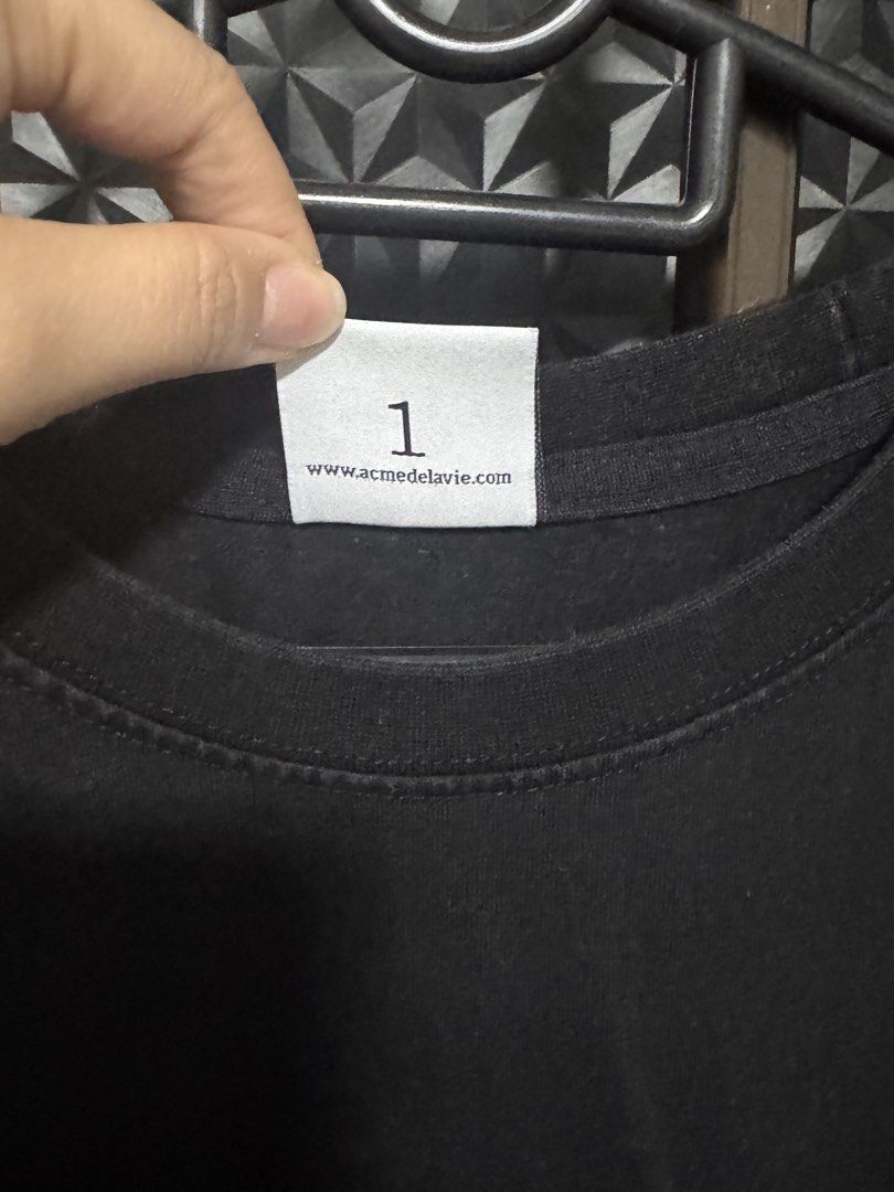 ADLV Acme De La Vie Lisa Collab Teddy Bear T-shirt (Category: Tshirts & Polo Shirts) located in Singapore. Submitted by xyjess (Listing ID 1436496523, Image 4). Description: - Authentic ADLV T-shirt - Size 1 - Black color - Features a teddy bear graphic on the back - Refer to care label for washing instructions.