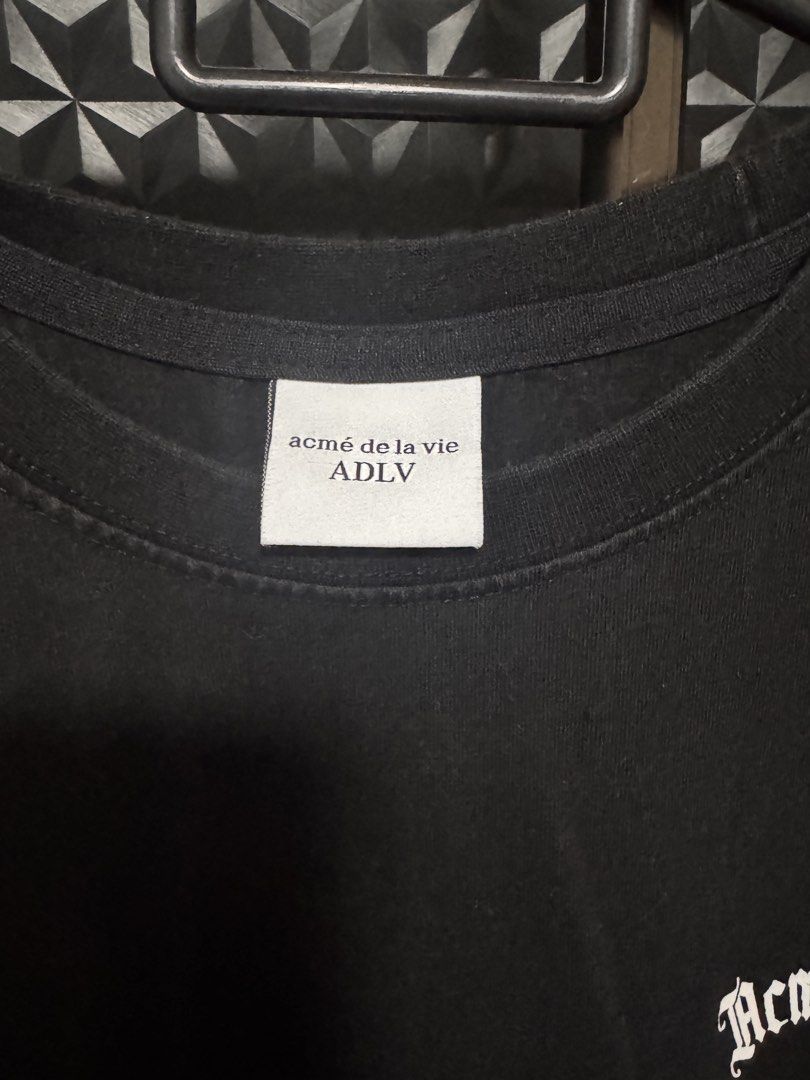 ADLV Acme De La Vie Lisa Collab Teddy Bear T-shirt (Category: Tshirts & Polo Shirts) located in Singapore. Submitted by xyjess (Listing ID 1436496523, Image 3). Description: - Authentic ADLV T-shirt - Size 1 - Black color - Features a teddy bear graphic on the back - Refer to care label for washing instructions.