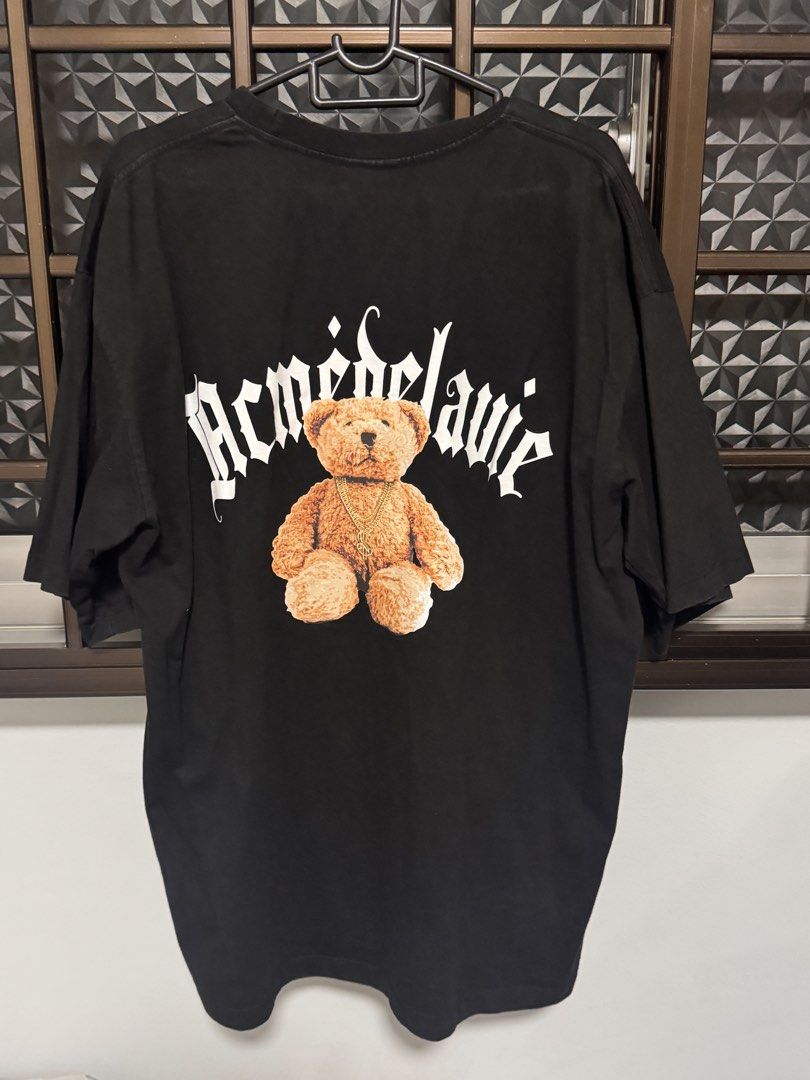 ADLV Acme De La Vie Lisa Collab Teddy Bear T-shirt (Category: Tshirts & Polo Shirts) located in Singapore. Submitted by xyjess (Listing ID 1436496523, Image 1). Description: - Authentic ADLV T-shirt - Size 1 - Black color - Features a teddy bear graphic on the back - Refer to care label for washing instructions.