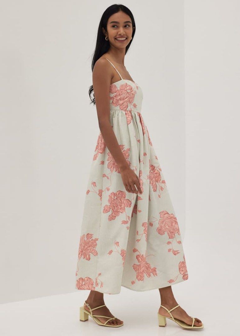 Love Bonito Tanya Ruched Babydoll Dress in Prosperous Blooms Floral Print Midi Dress with Spaghetti Straps (Category: Dresses) located in Singapore. Submitted by tealapricot (Listing ID 1445336468, Image 3). Description: - Size XS - Willing to trade for size M! - Has pockets! - Spaghetti straps - Gathered waist - Flowy, mid-calf length skirt - Ideal for summer or casual outings ——————————————————————————— ➡️NO ADDITIONAL PICTURES, items are as th