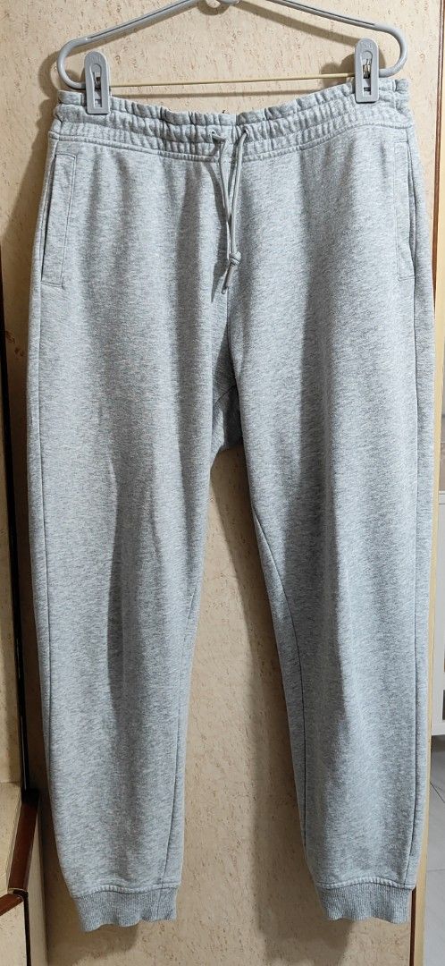 Grey Sweatpants - L (165/68A) (Category: Activewear) located in Singapore. Submitted by blueskybeautifulclouds (Listing ID 1445671546, Image 1). Description: - Grey, L (165/68A) - Elastic waistband with drawstring - Two side pockets + zipper back pocket - Ribbed cuffs at the ankles - Measurements - Waist: 30cm (Dia) / Hip: 57.5cm (Dia) / Length: 95.5cm / Cuff: 13.5cm (Dia) .