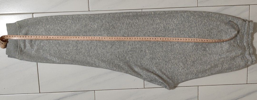 Grey Sweatpants - L (165/68A) (Category: Activewear) located in Singapore. Submitted by blueskybeautifulclouds (Listing ID 1445671546, Image 6). Description: - Grey, L (165/68A) - Elastic waistband with drawstring - Two side pockets + zipper back pocket - Ribbed cuffs at the ankles - Measurements - Waist: 30cm (Dia) / Hip: 57.5cm (Dia) / Length: 95.5cm / Cuff: 13.5cm (Dia) .