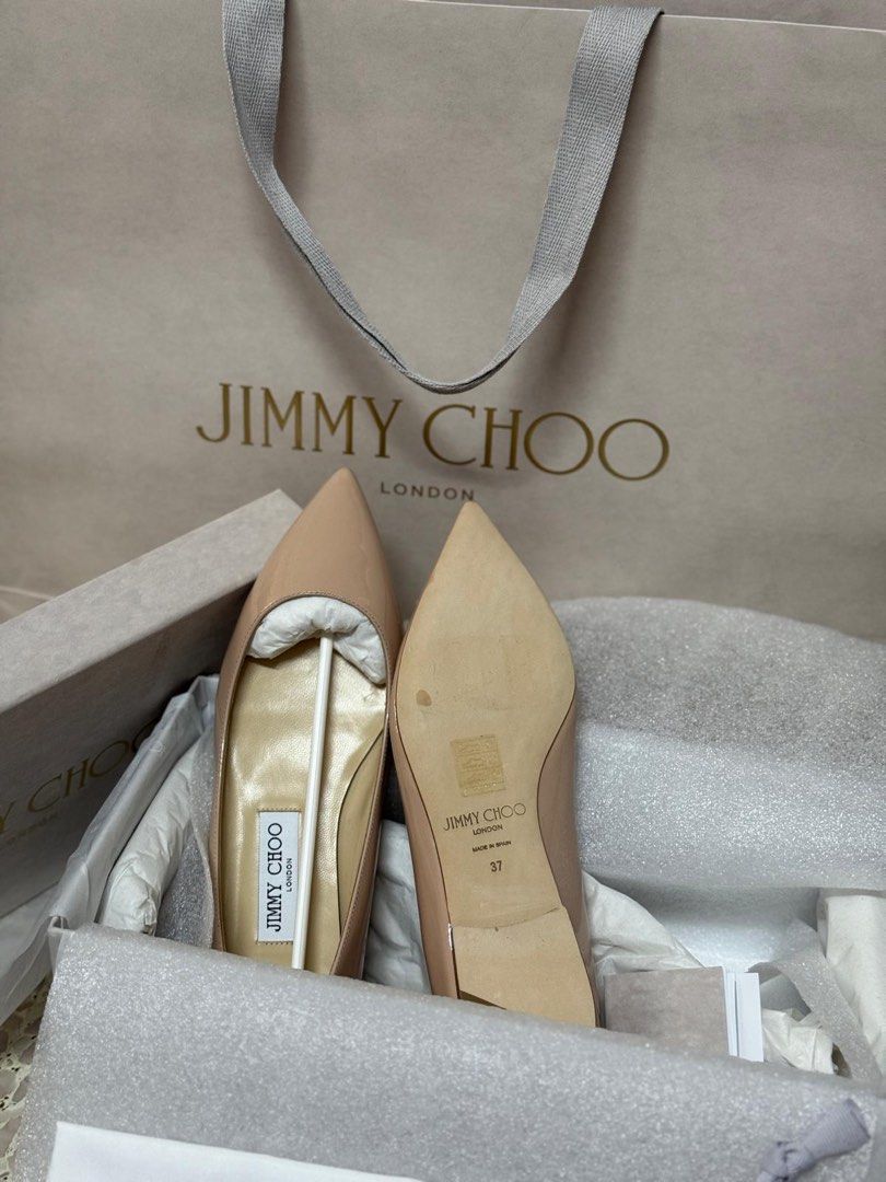 Jimmy Choo Aline Powder Pink Eu37 (Category: Flats) located in Singapore. Submitted by th_99 (Listing ID 1448724446, Image 5). Description: - Original Price at $490++ - Authentic Jimmy Choo flats - Patent leather in nude/beige - Pointed toe design - Size: EU 37 - Includes original box, dust bag, and authenticity cards - Perfect for any occasion, dress up or down.